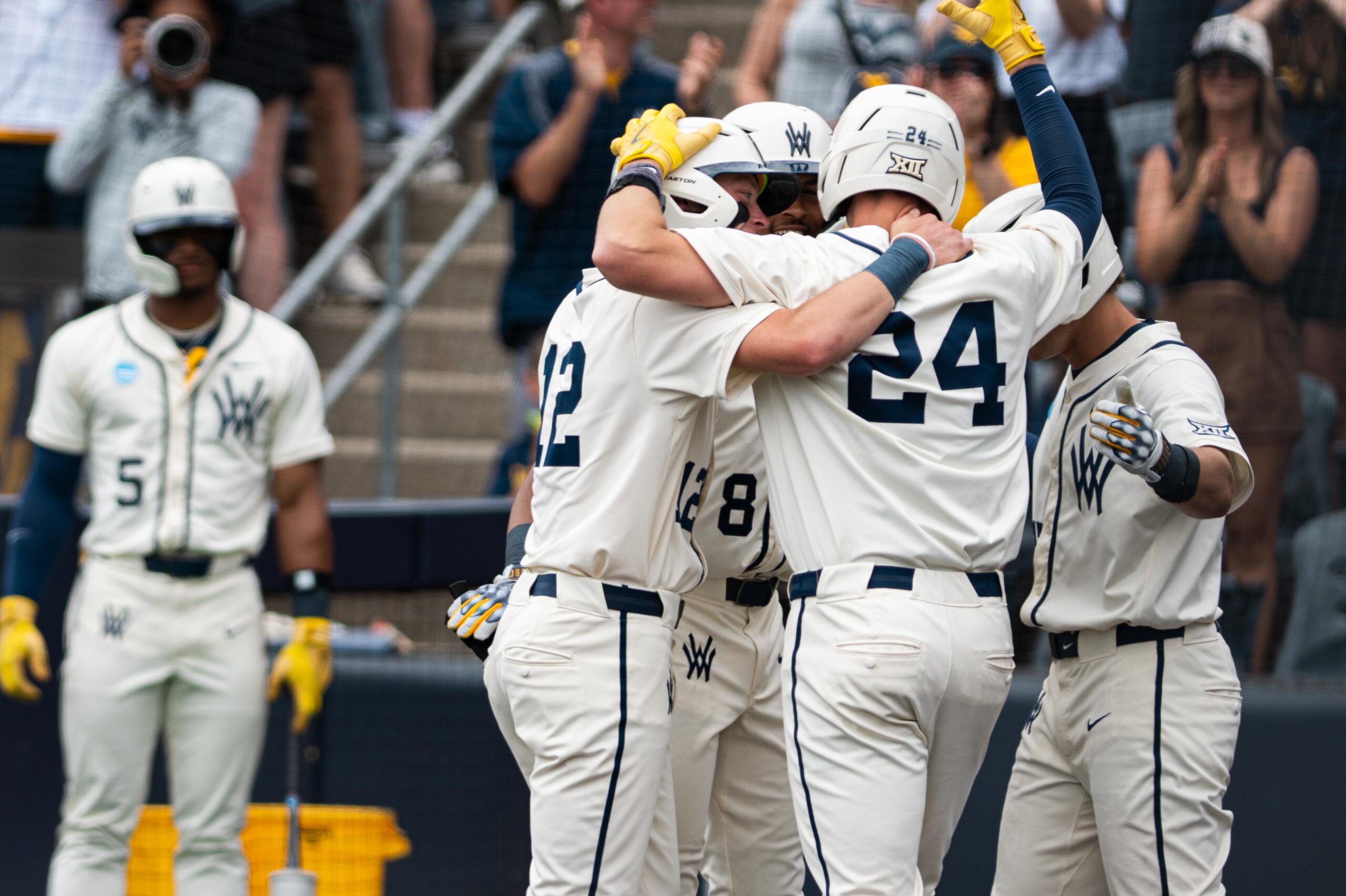 Homers galore | WVU baseball smashes 5 home runs to beat Cal Poly, advancing to 1st-ever College World Series